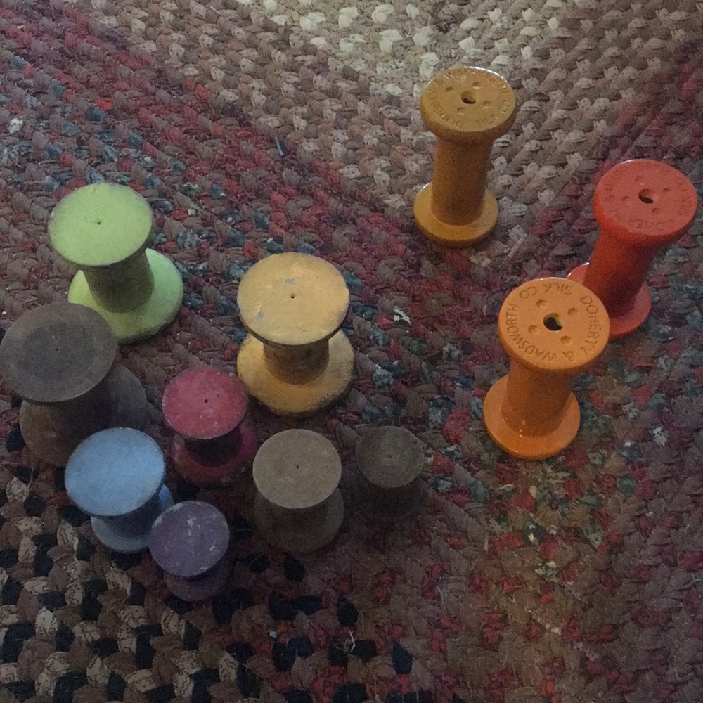 Collection of decorative spools.